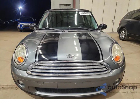 2010 Mini Cooper z USA, uszkodzony, nr VIN WMWMF3C53ATU78886